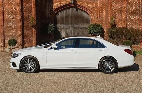 Simons white wedding cars