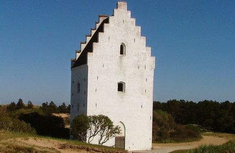 The sand-covered church